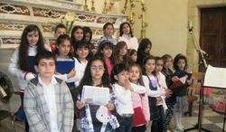 Canto conclusivo con tutti i bambini uniti per ricordare il 150 anniversario dell’unità d’Italia